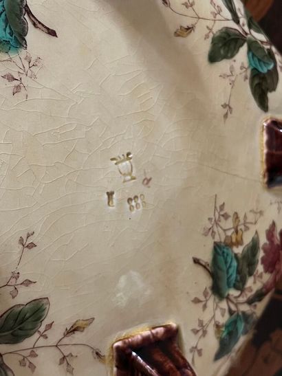 Two four-legged earthenware dishes decorated...