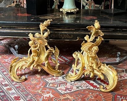 Pair of Louis XV style gilt bronze andirons...