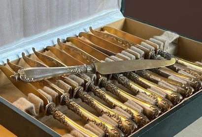 Set of 12 cheese knives, handles in forged...