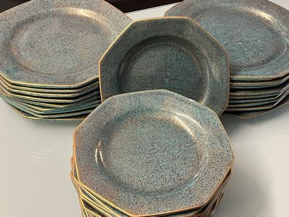 Part of a table service in blue glazed earthenware,...
