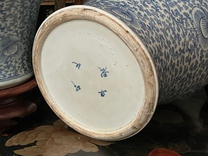 Pair of polychrome enameled porcelain jars...