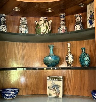 Set of polychrome earthenware vases (chips...