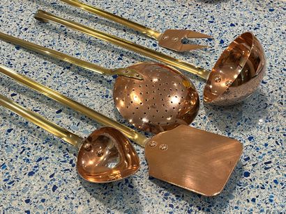Set of copper saucepans