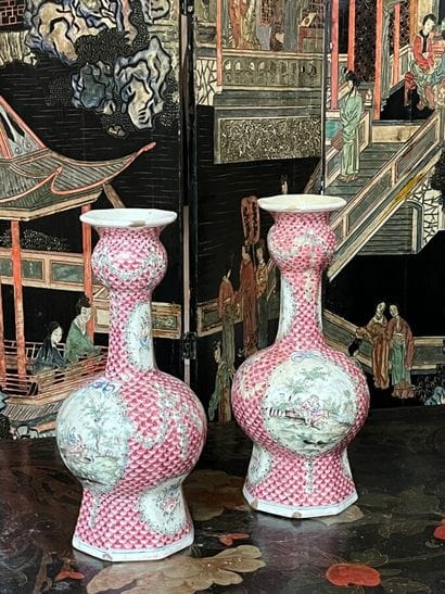 Pair of earthenware vases decorated in pink...