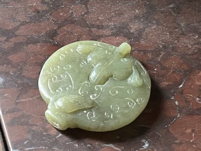 Archaic-style jade medallion decorated with...