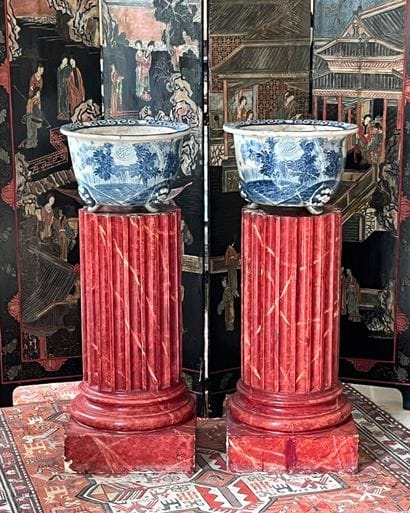 Pair of fluted terracotta columns painted...