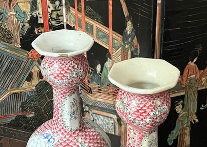 Pair of earthenware vases decorated in pink...
