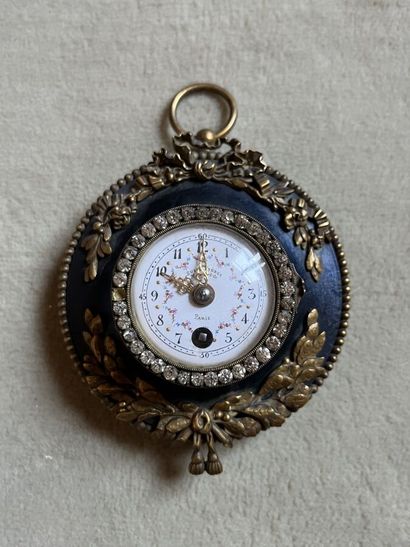 Pendule d'applique ronde de style Louis XVI
Hauteur...