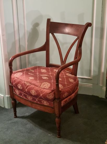 Fauteuil d'époque Empire en bois sculpté...