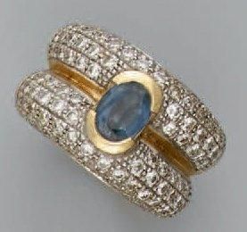 Bague en or jaune et or gris à demijonc sertis...