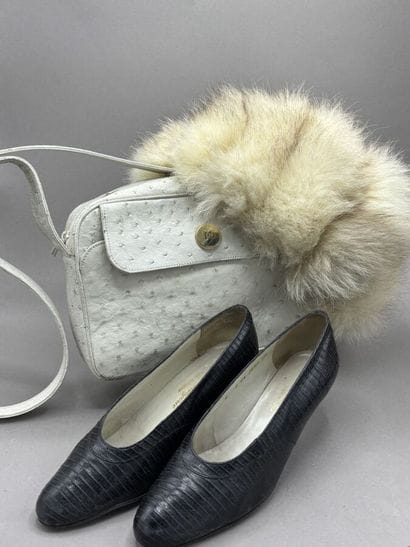 Lot de vêtements
Toque en renard
Paire de...