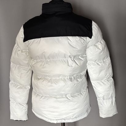 SCHOTT - Doudoune blanche et noire. 
Fermeture...