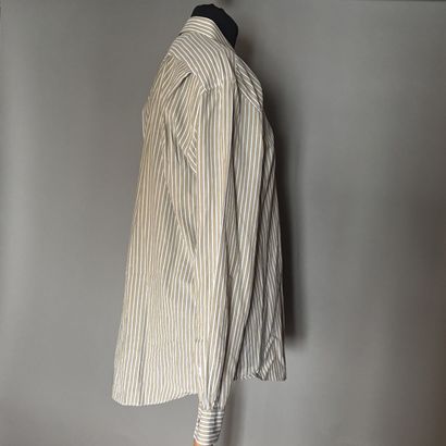 HERMES
Chemise homme à rayures beige et blanc...