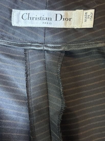 CHRISTIAN DIOR 
Pantalon noir à rayures horizontales
Taille...
