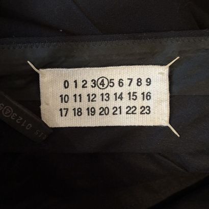 MARGIELA - Deux pantalons en laine noire....