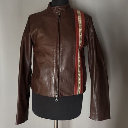 BIKKEMBERG - Vente en cuir marron ornée d'une...