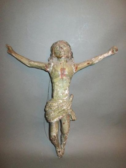Christ en croix en bois sculpté, les yeux...