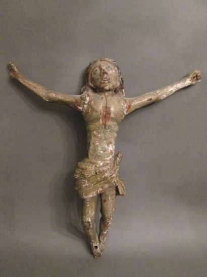 Christ en croix en bois sculpté, les yeux...