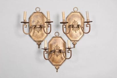Suite de trois appliques octogonales en métal...