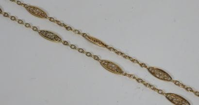 COLLIER DRAPERIE en or jaune 18k (750 millièmes).
Poids:...