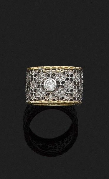 BAGUE en or gris et or jaune 18k (750 millièmes)...