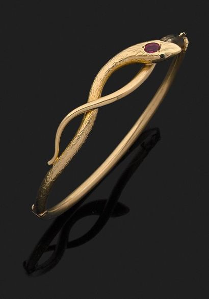 BRACELET SERPENT ouvrant en or jaune 18k...