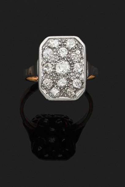 BAGUE en or jaune et gris 18k (750 millièmes)...