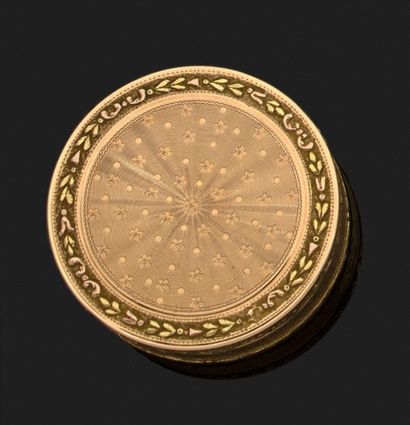 BOÎTE ronde en or jaune 18k (750 millièmes)...
