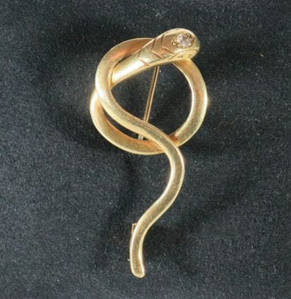 BROCHE SERPENT en or jaune 18k (750 millièmes)...