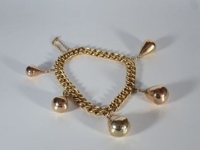 BRACELET GOURMETTE en or jaune 18k (750 millièmes)...