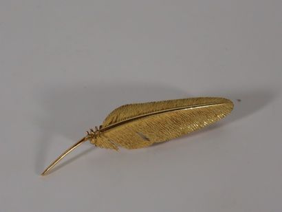 BROCHE PLUME en or jaune 18k (750 millièmes).
Poids:...