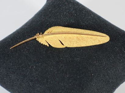 BROCHE PLUME en or jaune 18k (750 millièmes).
Poids:...