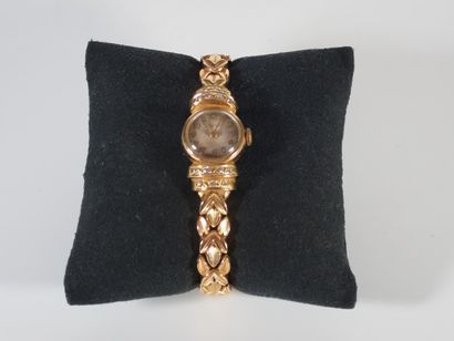 MONTRE DE DAME en or jaune 18k (750 millièmes),...