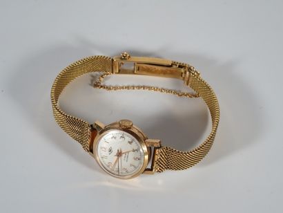 MONTRE DE DAME en or jaune 18k (750 millièmes)...