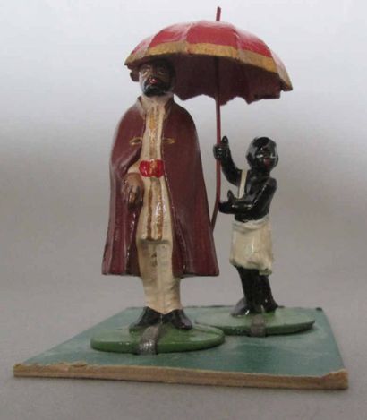 LE MAÎTRE ET LE PORTEUR D'OMBRELLE, ensemble...