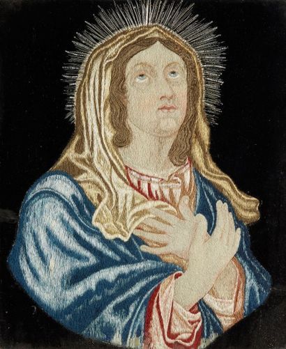 FRAGMENT DE BRODERIE déposé sur un tissu...