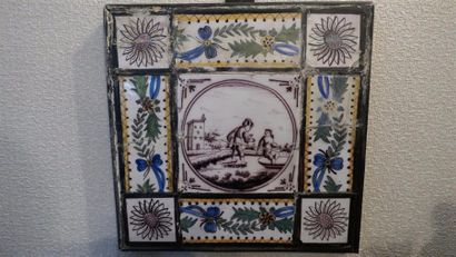 DEUX CARREAUX DE FAÏENCE à décor manganèse...