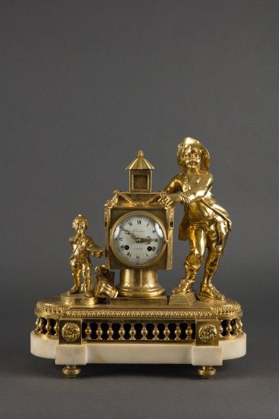 PENDULE dite «à la lanterne magique» en bronze...