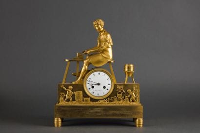 PENDULE dite «au tonnelier» en bronze ciselé...