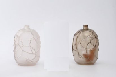 René LALIQUE (1860-1945)

Modèle églantine.

Deux...