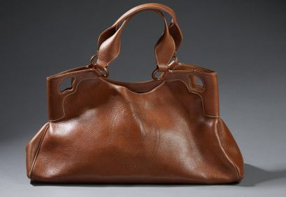 CARTIER

Sac à main en cuir marron tabac...