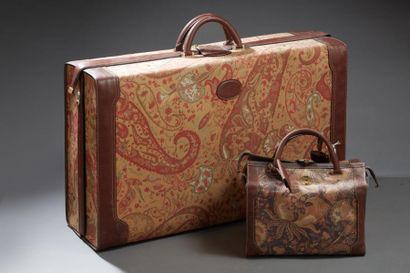 Christian DIOR 

Valise en tissu à décor...