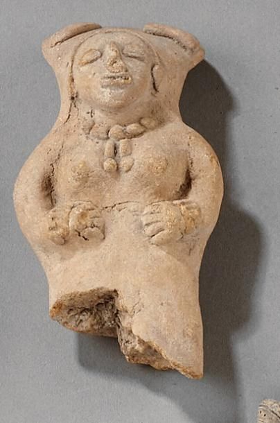 Figurine féminine en céramique (manque la...