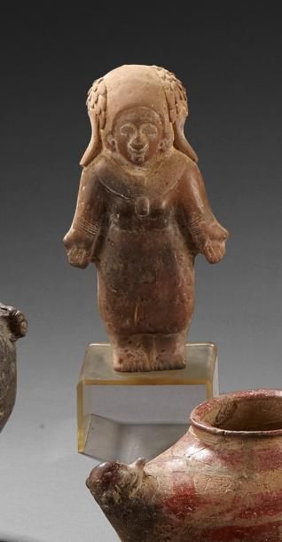 Statuette représentant une femme en terre...