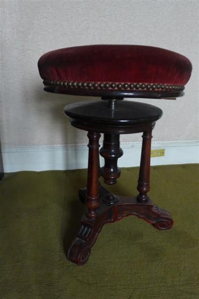 Tabouret de piano en palissandre a vis reposant...