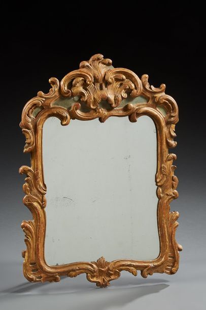 Miroir de style baroque en bois doré et laqué...