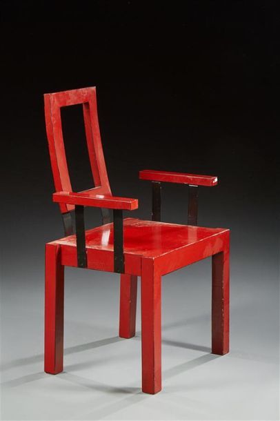 Fauteuil en bois et métal laqué rouge et...