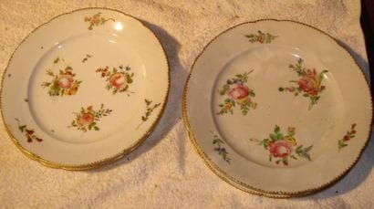 PARIS
Suite de cinq assiettes en porcelaine...