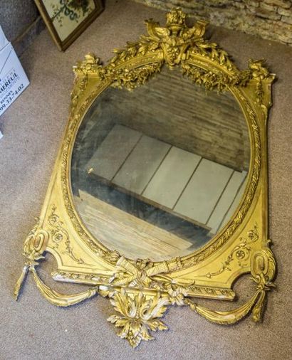 Miroir ovale à glace biseautée, encadrement...