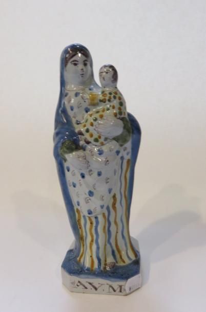 RENNES
Vierge à l'Enfant en faïence polychrome....